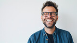 Very happy laughing man with glasses in front of white background with copy space