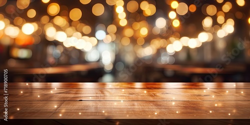 Blurred restaurant lights backdrop with wooden table