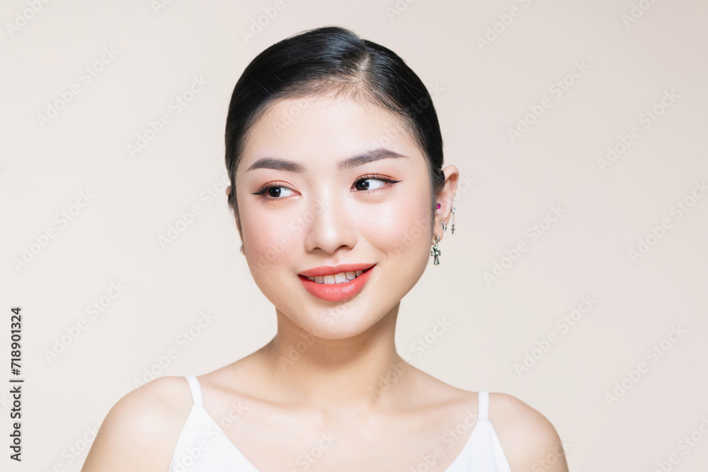 Beauty woman healthy clean skin beautiful female young model isolated on beige Beauty woman healthy clean skin beautiful female young model isolated on beige