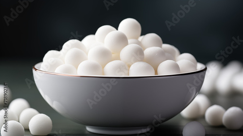 Delight in the sweetness of Tangyuan, traditional sweet rice balls, a festive treat symbolizing unity and completeness, cherished during special occasions photo