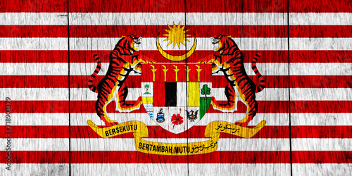 Flag and coat of arms of Malaysia on a textured background. Concept collage.
