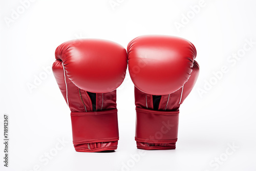 Red boxing gloves on a white background © tribalium81