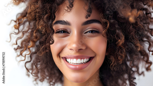 Closeup portrait of Beautiful smiling happy woman with curly hair on white background