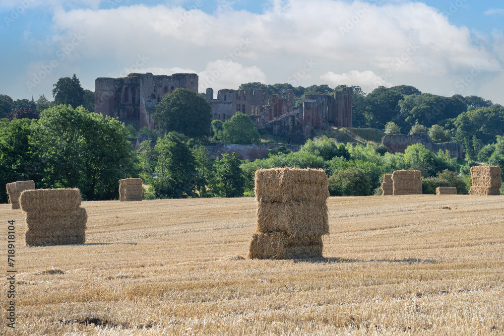 Bales of hay agains  a  castle  background  