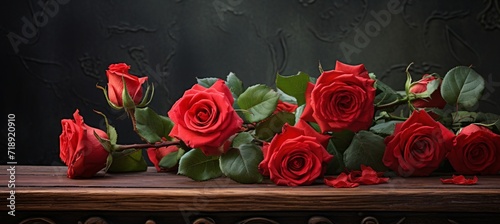 red roses on rusty table