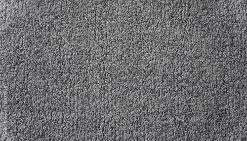 Close-up of grey monochrome carpet texture background for interior flooring material. office carpet background.