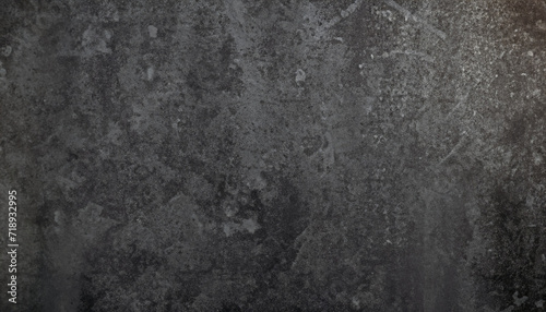 Grunge grey rusty on dark black metal wall background texture used as a banner panorama.