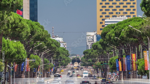 Traffic on the Deshmoret e Kombit Boulevard in Tirana timelapse. photo