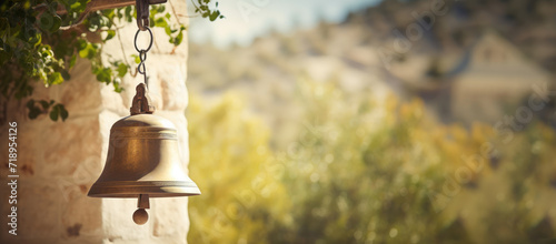 Bell in a monastery closeup with space for text photo