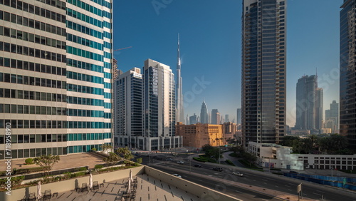 Aerial panoramic view to Dubai downtown and difc skyscrapers night to day timelapse. © neiezhmakov