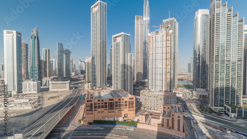 Aerial view of Dubai Downtown skyline with many towers timelapse.