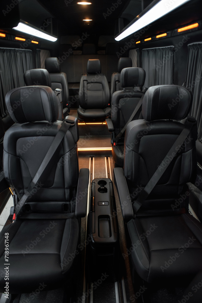 Comfortable interior of a passenger bus with soft seats. The design is made to order. Private covering of cars. Various elements of the bus interior. Comfortable interior of a passenger bus with soft seats. The design is made to order. Private covering of cars. Various elements of the bus interior.