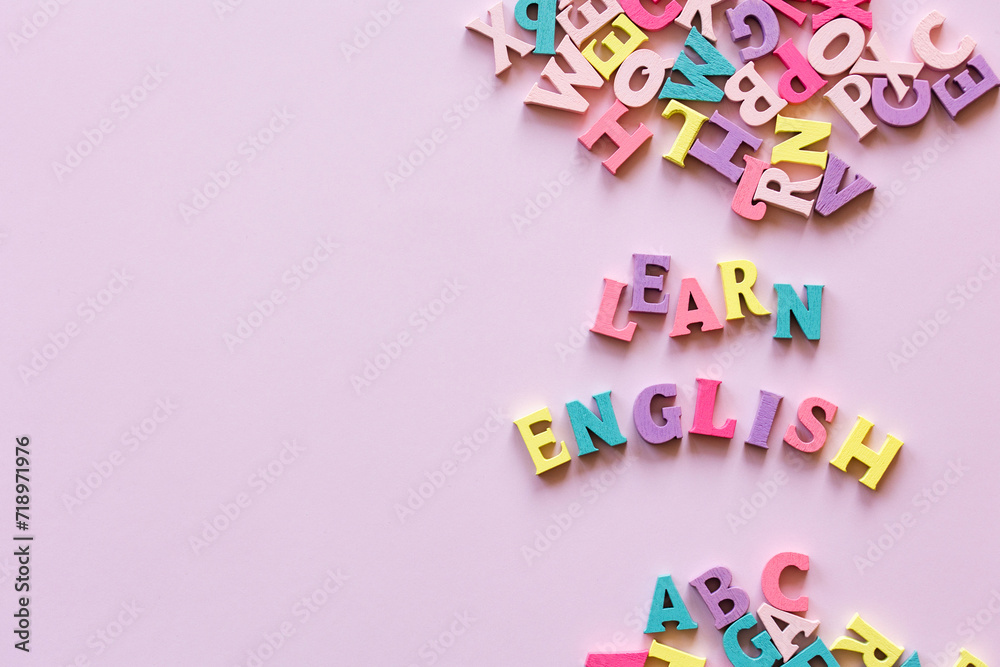 text learn english letters on pink background. Educational game. text learn english letters on pink background. Educational game.
