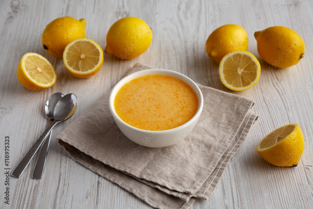 Homemade Organic Lemon Curd in a Bowl, side view. Homemade Organic Lemon Curd in a Bowl, side view.
