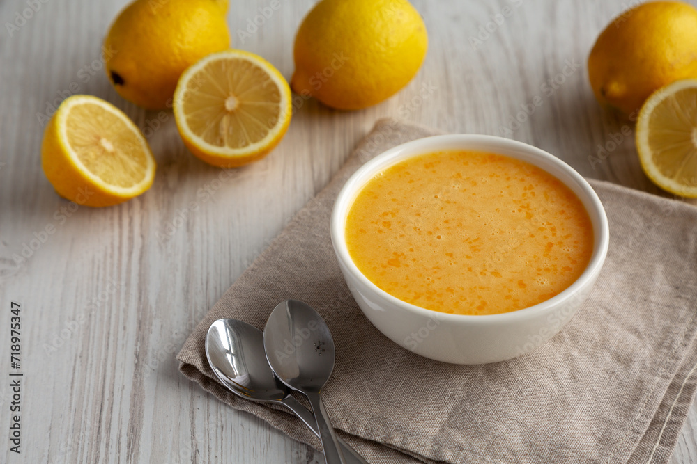 Homemade Organic Lemon Curd in a Bowl, side view. Homemade Organic Lemon Curd in a Bowl, side view.