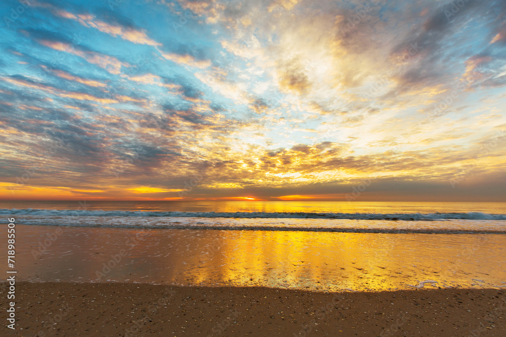 Watching the Wrightsville beach sunrise from the sand.