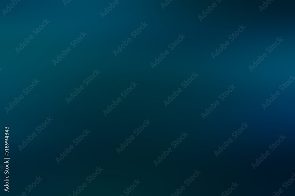 A dark blue soft focus plain abstract background with copyspace