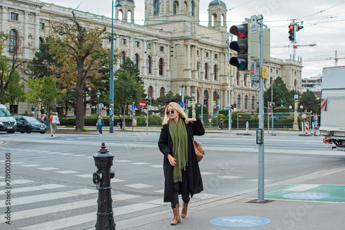 Vacation in Austria - Vienna. Concept of tourism and holidays. Woman in city streets, urban scene