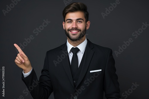 Confident Businessman Pointing, Directing Attention Professionally.