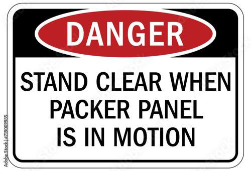 Truck safety sign stand clear when packer panel is in motion