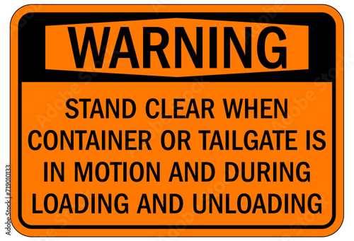 Truck safety sign stand clear when container or tailgate is in motion during loading and unloading