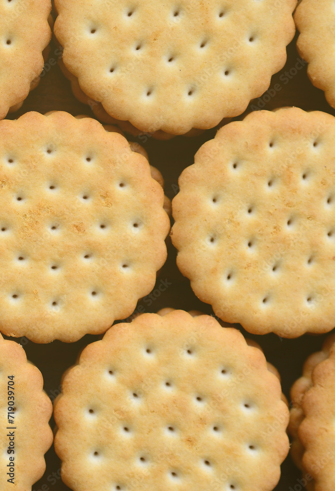 Detailed picture of round sandwich cookies with coconut filling. Background image of a close-up of several treats for tea Detailed picture of round sandwich cookies with coconut filling. Background image of a close-up of several treats for tea
