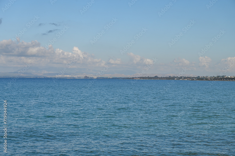 sea ​​view of mountains and stones from the embankment on the island of Cyprus in winter 12