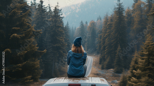 Adventure Awaits - Woman Embracing the Wilderness from Her Car photo