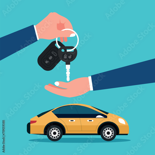 Dealer hand giving keys chain to a buyer hand. Buying or renting a car.