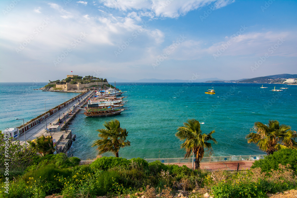 The road goes to Pigeon Island in Kusadasi. Kusadasi is a popular tourist destination in Turkey.