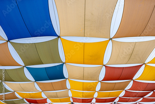 Colorful canvas fabric roof and steel structure, multicolor fabric tensile roof.
 photo