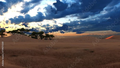 Dark clouds running over hills with green trees