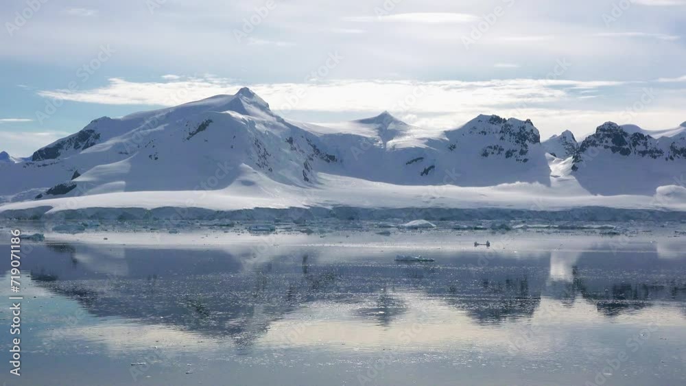 Antarctica landscape. Icebergs in the ocean and mountains. Global warming and climate change. Expedition to the Antarctic Peninsula. Eco system nature and environment. Antarctica landscape. Icebergs in the ocean and mountains. Global warming and climate change. Expedition to the Antarctic Peninsula. Eco system nature and environment.