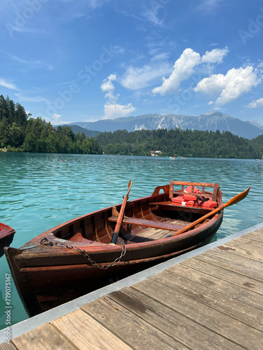 Boat in the blue clear water and bright sky summer at the Lake Bled, Slovenia