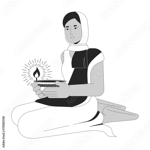 Lighting diwali diya black and white cartoon flat illustration. Young adult indian woman holding oil lamp 2D lineart character isolated. Festival of lights monochrome scene vector outline image