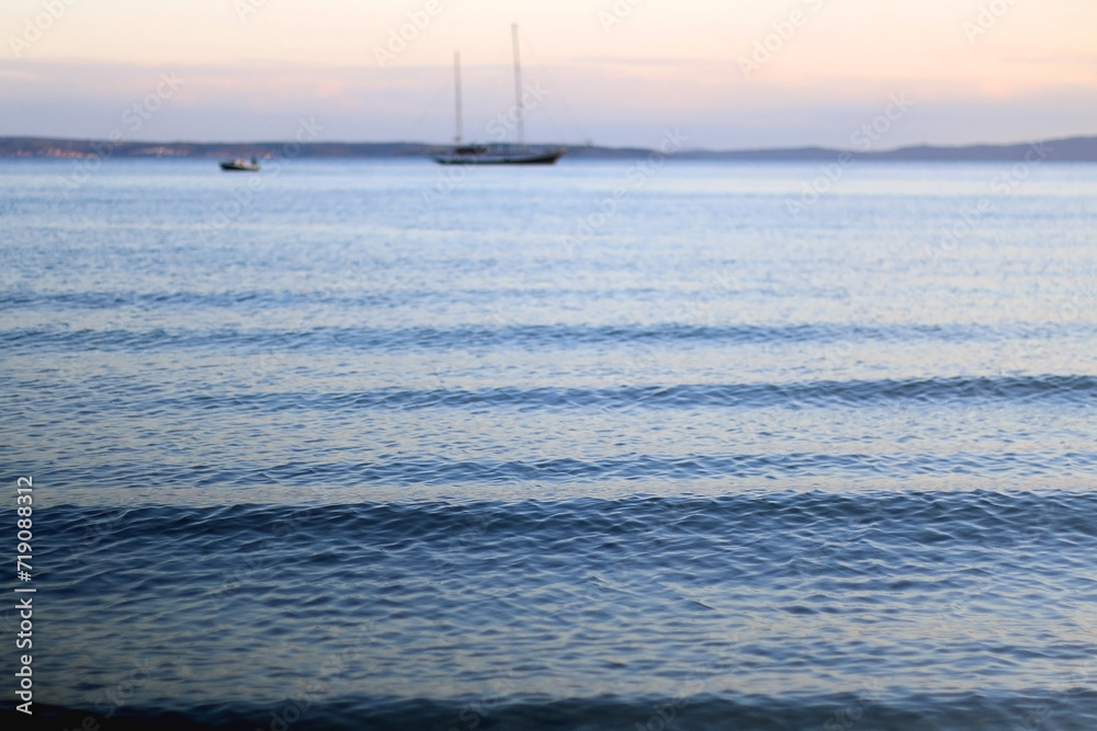 Obraz premium Bright blue sea and clear sky. Copy space.