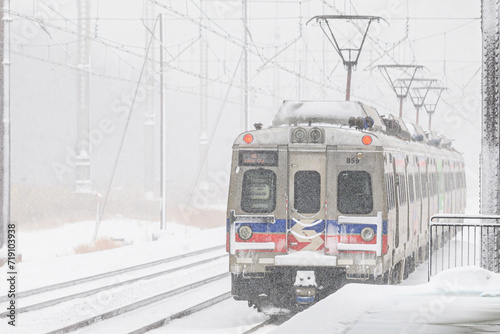 Claymont, DE USA 1-19-2024 - Set of SEPTA Silverliner Vs departing from Claymont statin during a snowstorm