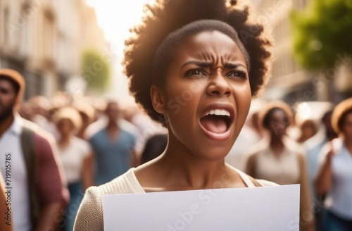 angry black girl screaming with poster on street. female activist protests against rights violation