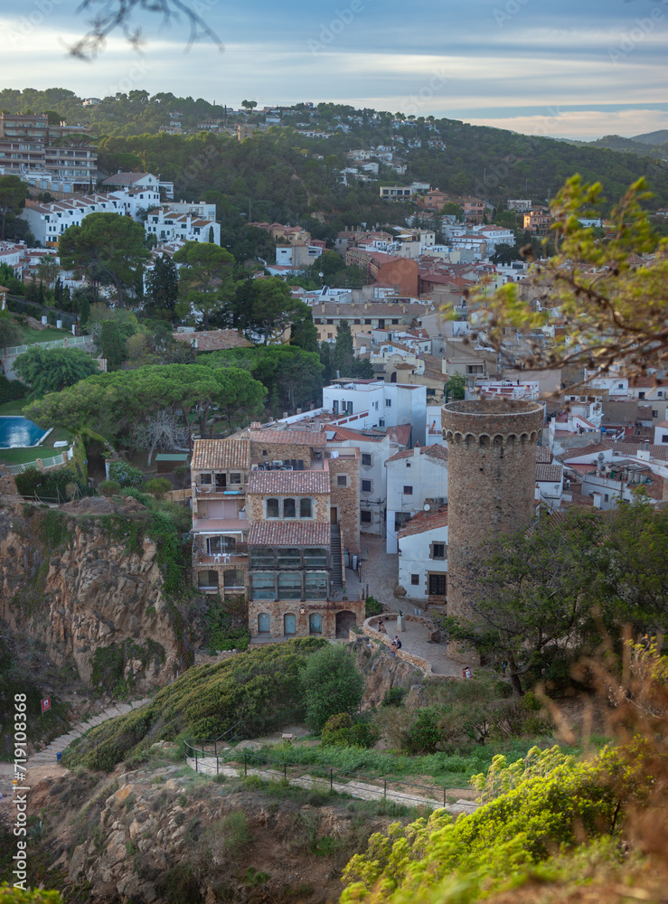 Catalonia, Tossa de Mar, quiet coastal town, resort, old fortress, narrow streets of the old town, panorama of the city, red roofs of houses, fortress tower, fortress ruins, cobbled streets, ancient w