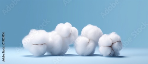 Set of cotton clouds. Wadding clouds on blue night-sky background.