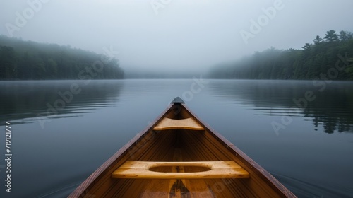 Foto Bow of a canoe in the morning on a misty lake in Ontario, Canada
