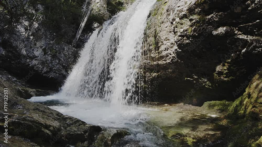 Alpine waterfall in the Dolomites, location unknown. Alpine waterfall in the Dolomites, location unknown.