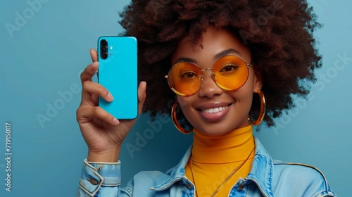 young woman pointing to her cell phone