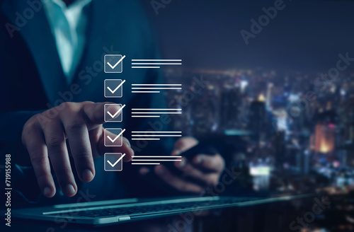 Checklist and fill out online survey form document management system Assessment form, questionnaire, checklist and clipboard management Businessman working on computer performance