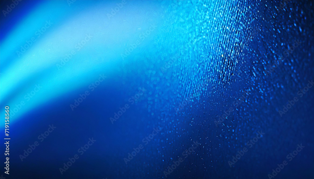 abstract blue background with grain. Unfocussed wall illuminated with neon light. Modern wallpaper abstract blue background with grain. Unfocussed wall illuminated with neon light. Modern wallpaper