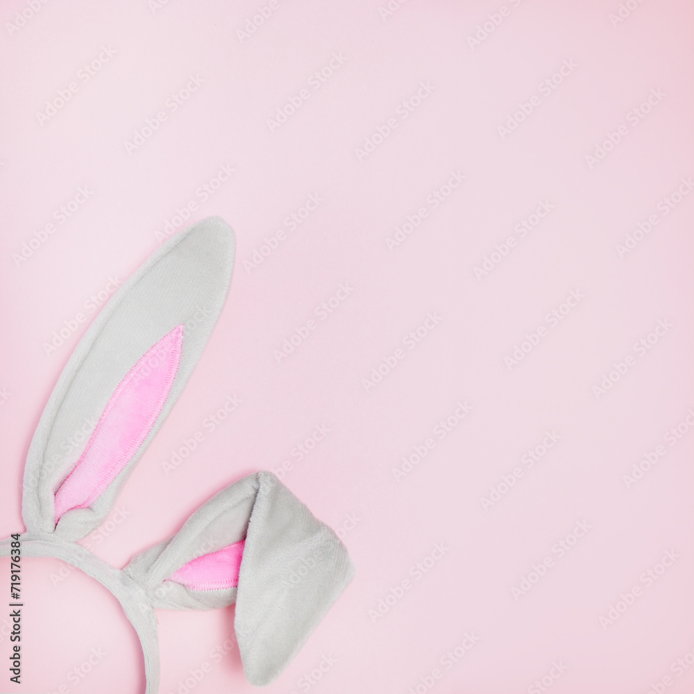 Rabbit ears headband for Easter on a pink background
