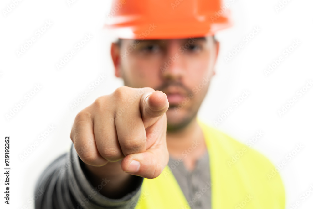 Selective focus close-up of builder pointing index finger Selective focus close-up of builder pointing index finger