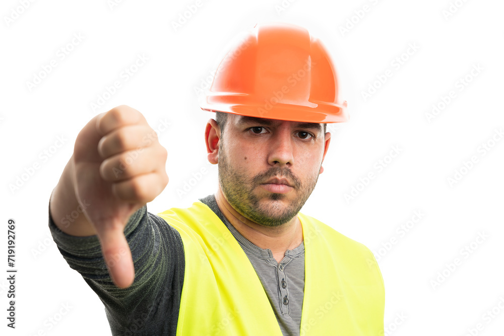 Builder male wearing helmet and vest showing dislike thumb-down