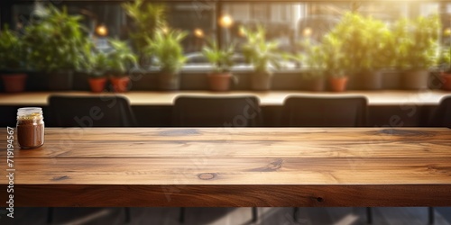 Wooden table top with coffee shop interior background, ideal for product display.