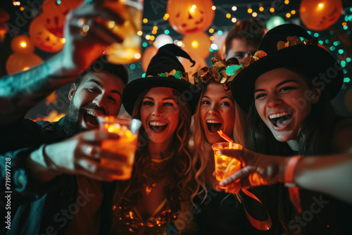 people in costume celebrating halloween together at a party 